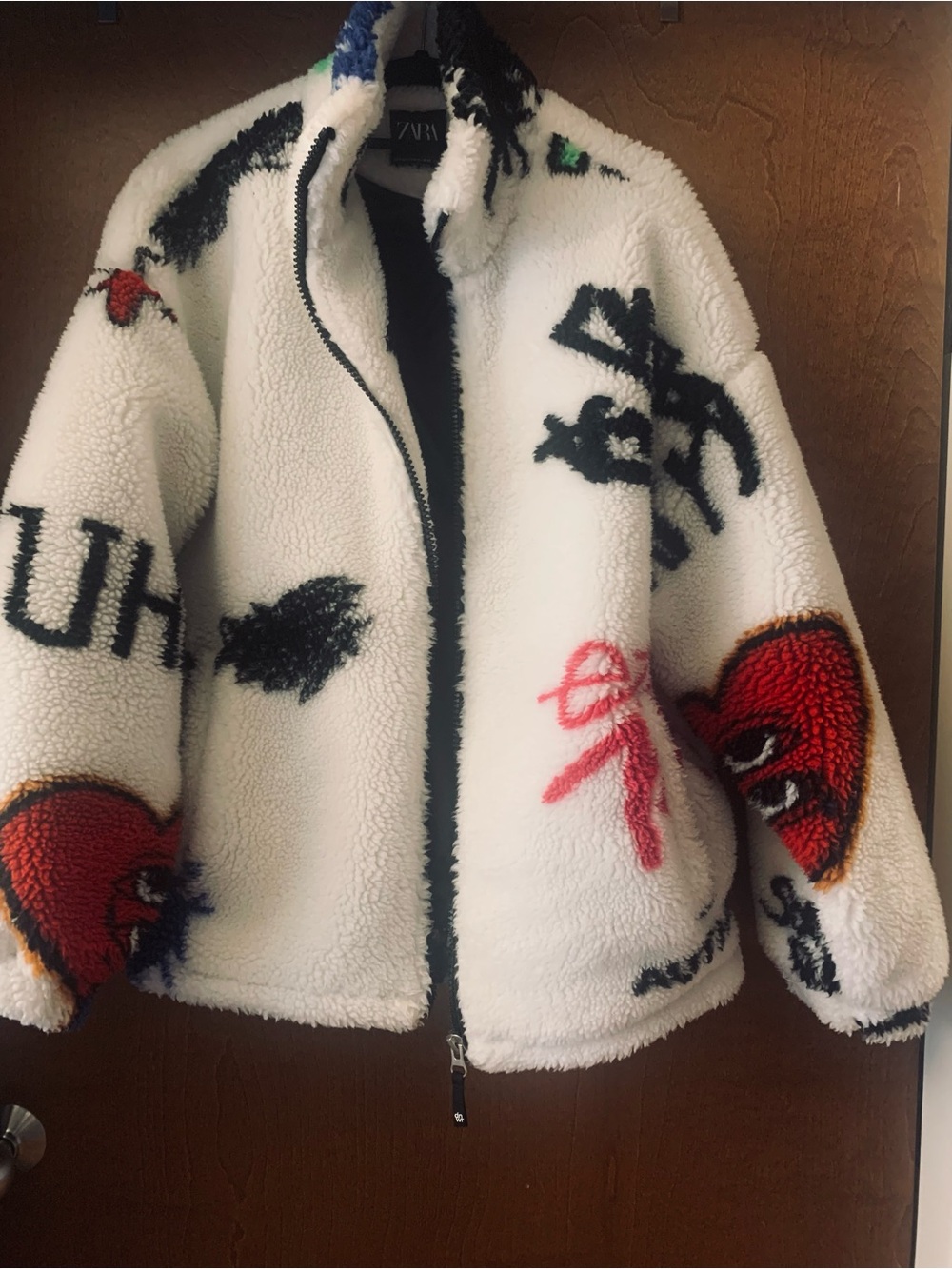 Zara White Sherpa Jacket with Red Heart and Black Graphic Accents